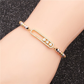 Bracelet en chaîne de perles colorées avec poignées ovales et rondes, orné de pierres de zircone