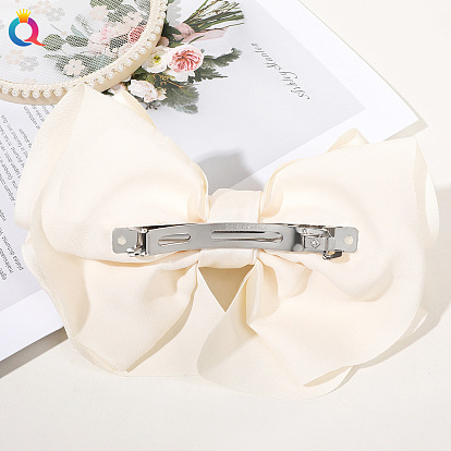 Charming Oversized Bow Hair Clip with Elastic Spring for Elegant Updo Hairstyles