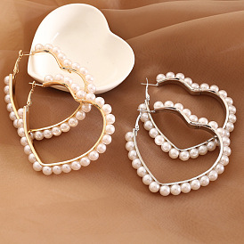 Unique Pearl Heart Earrings for Women - Creative and Bold Ear Studs (E281)