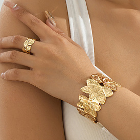Наборы из цветочного сплава: браслет-манжета и кольца-манжеты