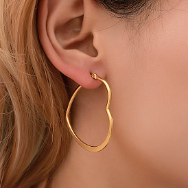 Geometric Heart Earrings: Classic, Minimalist, Statement Jewelry.