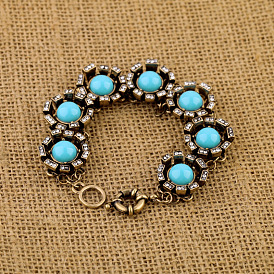 Vintage Blue Gemstone Design Bracelet with Diamond Inlay - Retro, Elegant, Jewelry.