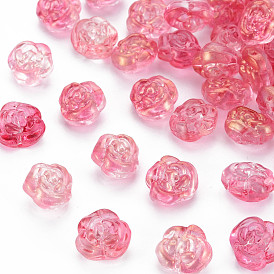 Des billes de verre transparentes, teints et chauffée, au pouvoir scintillant d'or, rose