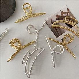 Retro Gold Alloy Hair Clip with Matte White and Electroplated Color Metal, Chic Large Claw Clip for Stylish Look.