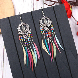 Bohemian Feather Tassel Earrings with Intricate Cutout Design