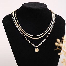 Vintage Heart Pendant Triple Layer Necklace for Women - Fashionable and Trendy Snake Chain Jewelry Accessory