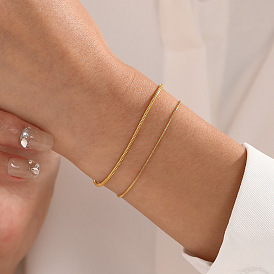 Bracelet chaîne en os de serpent en acier inoxydable - design minimaliste, polyvalent, mode européenne et américaine.