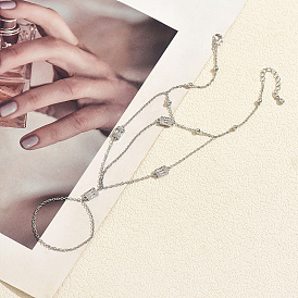 Elegantes pulseras de eslabones rectangulares multicapa de latón con circonitas cúbicas transparentes para mujer.