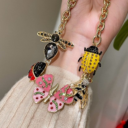 Нагрудник-подвеска в виде божьей коровки, бабочки, пчелы или стрекозы из эмалированного сплава со стразами., золотые