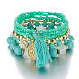 Multi-layered Pearl Bracelet with Coin Charm and Tassel Detail