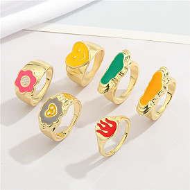 Irregular Oil Drip Ring with Cartoon Flower and Smiling Face Design