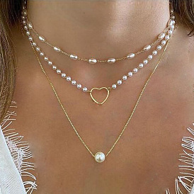 Chic Pearl Necklace with Butterfly Pendant and Diamond Accent - Triple Layer Collarbone Chain for Fashionable Women