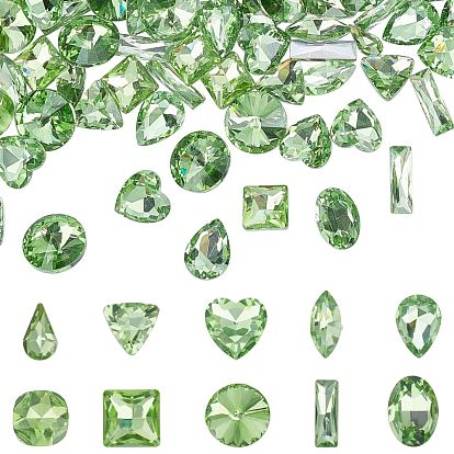 Señaló hacia cabujones de diamantes de imitación de cristal, facetados, formas mixtas