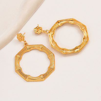 Серьги-гвоздики из сплава с круглыми полыми кольцами