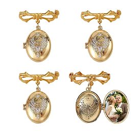 4 Broche con medallón de circonita cúbica transparente y micropavé de latón., lazo y óvalo con patrón de águila