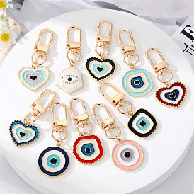 Simple personality color dripping eyes love key chain alloy irregular round eye bag pendant accessories