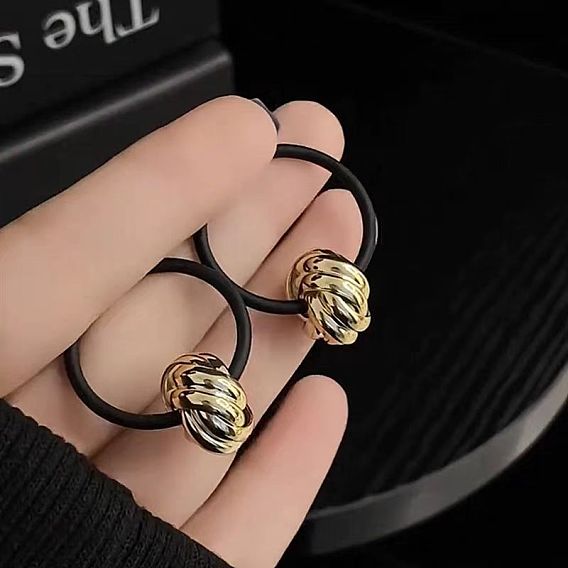 Серьги-кольца из сплава с узлами, с латунным