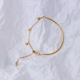 Élégant bracelet de perles à demi-articulation avec pompon et billes en acier plaqué or 14 carats