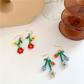 Japanese exaggerated niche rice bead flower earrings crystal woven flower color earrings beaded cute spiral ear clip female