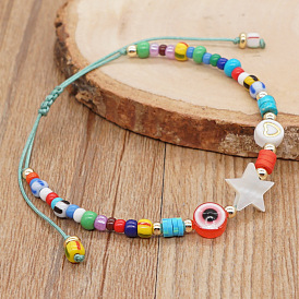 Bracelet arc-en-ciel en perles d'oeil d'étoile en acrylique boho chic pour femme