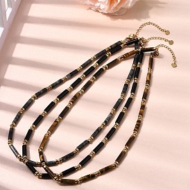 Колье из бусин из натурального камня и синтетического немагнитного гематита в форме колонн с цепочками из нержавеющей стали., золотые