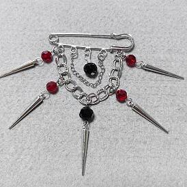 Broches fer, avec des pendentifs en perles de verre et en alliage
