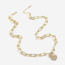 Heart-shaped lock collarbone necklace with brass plating and rhinestone embellishments