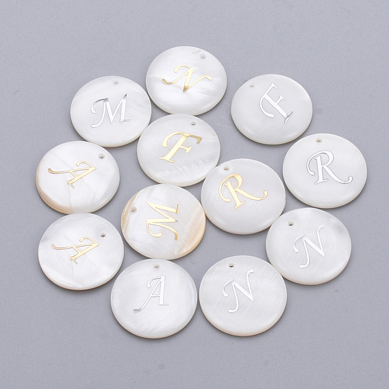 Подвески из пресноводных оболочек, покрыты железными находками, плоские круглые с начальной буквой