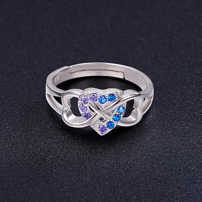 SHEGRACE Perfect Design 925 Sterling Silver Finger Ring, Heart in Infinity with Half Violet AAA Cubic Zirconia and Half Blue AAA Cubic Zirconia, 17mm