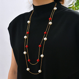 Collier de perles double couche à la mode pour pull pour femme, élégant et chic.