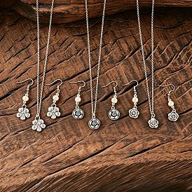 Conjunto de pendientes colgantes y collares con colgante de flor de imitación de perla de aleación de zinc para mujer.