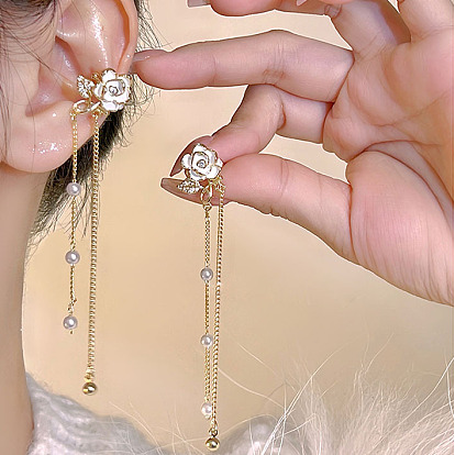 Sweet white flower clip-on earrings with long tassel - boho style, high-end, ear accessory.