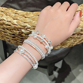 Fashionable Double-layer Pearl Bracelet with Diamond Inlay - Unique and Cool Hand Accessory.