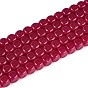 Нити бусин из красного корунда, выращенного в лаборатории, игральная кость
