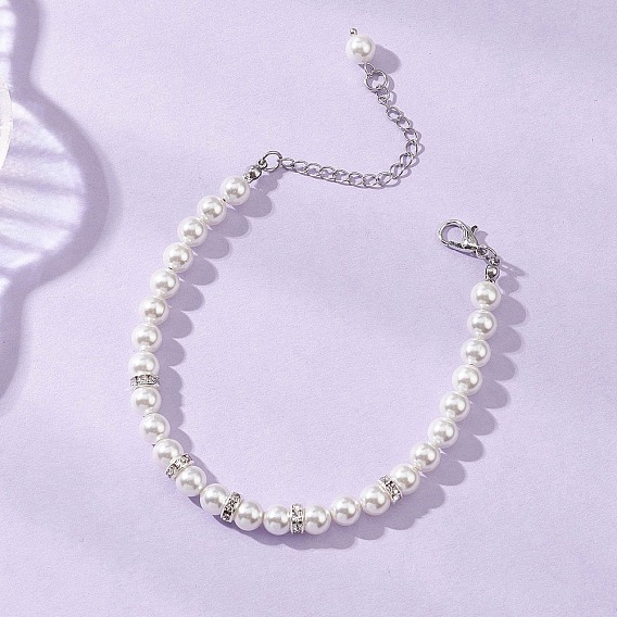 Женский браслет из круглых бусин с ракушками и латунными стразами