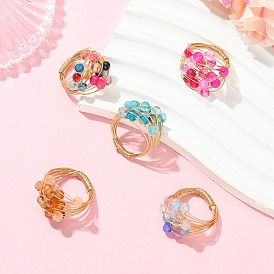 5количество колец из круглого агата, обмотанных медной проволокой, окрашенных и подвергнутых термической обработке., золотой свет