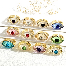 Кольцо-солитер с микропаве из латуни и кубическими цирконами, манжеты со стеклом, злые глаза