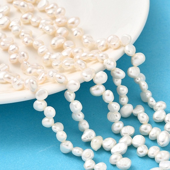 Нити из натурального культивированного пресноводного жемчуга, двух сторон полированной, класс 5а+, Топ пробуренной