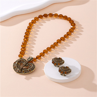 Ожерелья и серьги-гвоздики из сплава сердечек, стекла и стразов