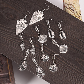 Boho Chic Seashell Earrings with Silver Tribal Bird Pattern - Statement Ear Drops for Beach Vacation Style