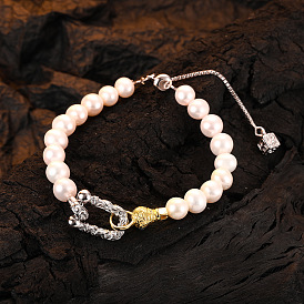 French-style luxury pearl bracelet with silver and gold contrast, featuring delicate Tang grass pattern for women's high-end fashion.