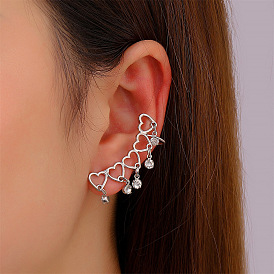 Heart-shaped Tassel Ear Cuff for Women, Minimalist Design with Chain and Clip-on Closure.