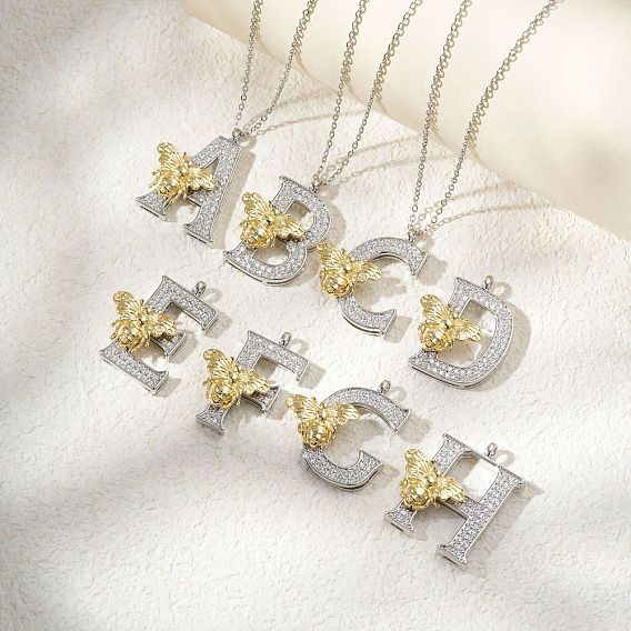 Подвеска в виде пчелы с микропаве из прозрачного кубического циркония в виде микрофибры, латунная, с инициалами., платиной и золотом