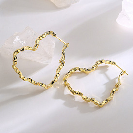 Fashionable Copper-Plated Gold Heart Earrings with Unique Design and High-end Appeal for Women