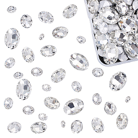 Señaló hacia cabujones de diamantes de imitación de cristal, facetados, oval