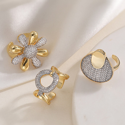 Латунные кольца-манжеты с микропаве из прозрачных кубических цирконий, платиной и золотом