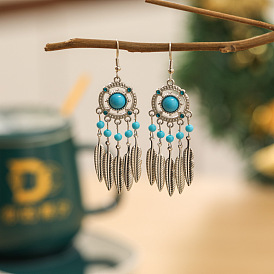 Серьги из сплава из смолы, плоские круглые с пером, серебряные