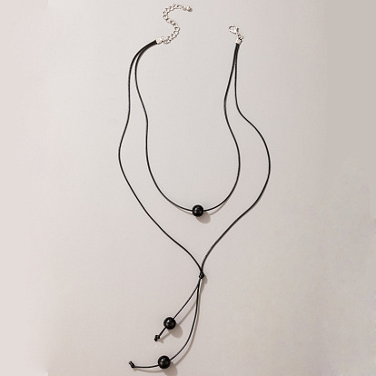 Collier géométrique chic double épaisseur avec cordon tissé et perles