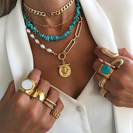 Collier multicouche turquoise de style bohème avec chaîne de perles vintage et pendentif superposé de pull