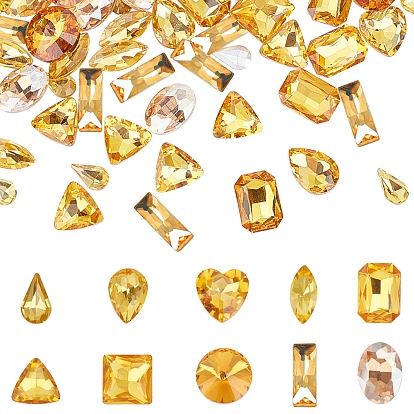 Señaló hacia cabujones de diamantes de imitación de cristal, facetados, formas mixtas